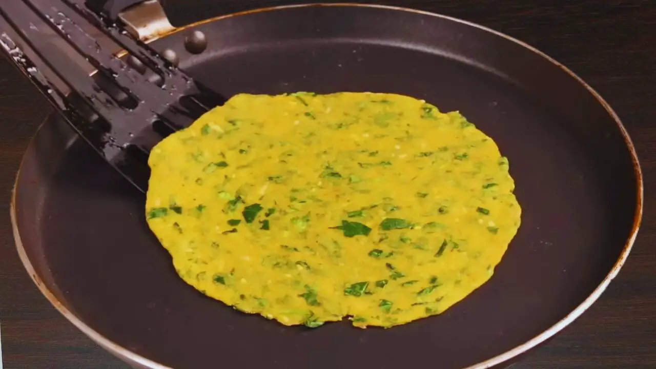 Flipping Methi Paratha 