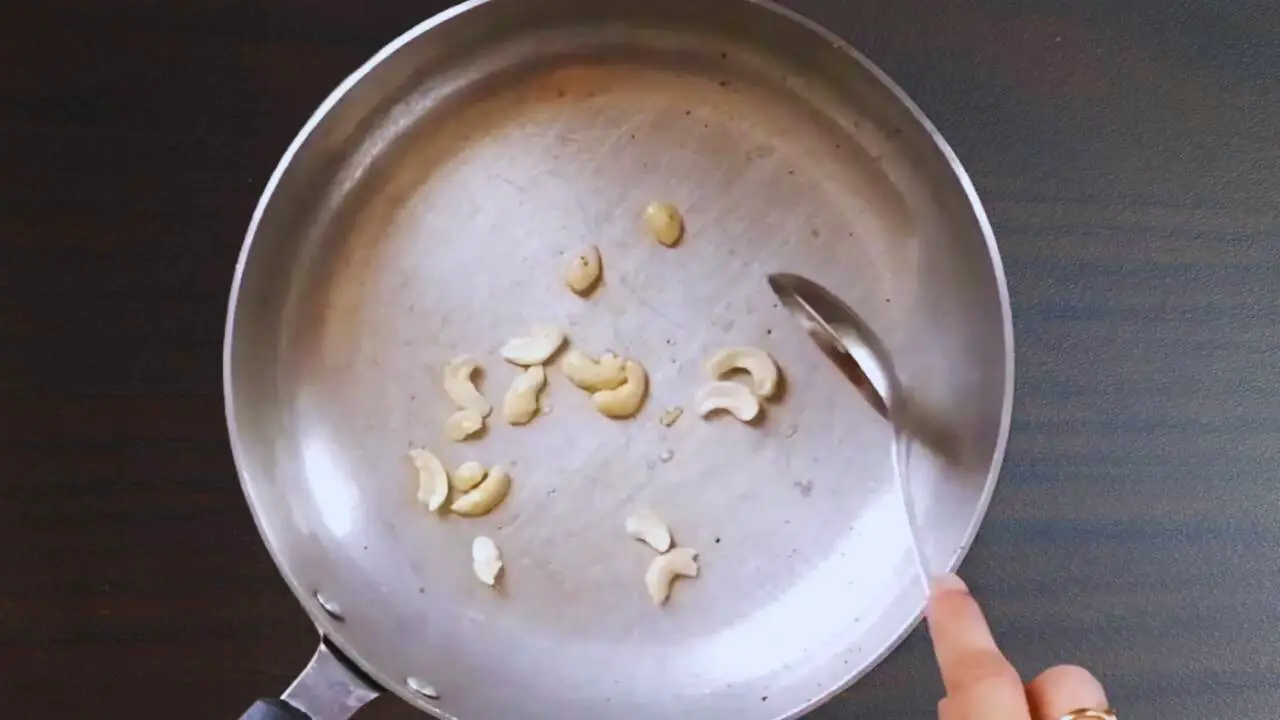 Masala bhat recipe step 8 Frying cashew nuts