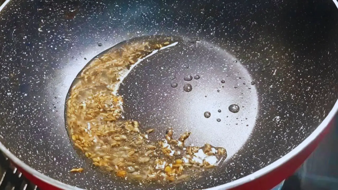 Poha recipe step 3 Frying whole spices