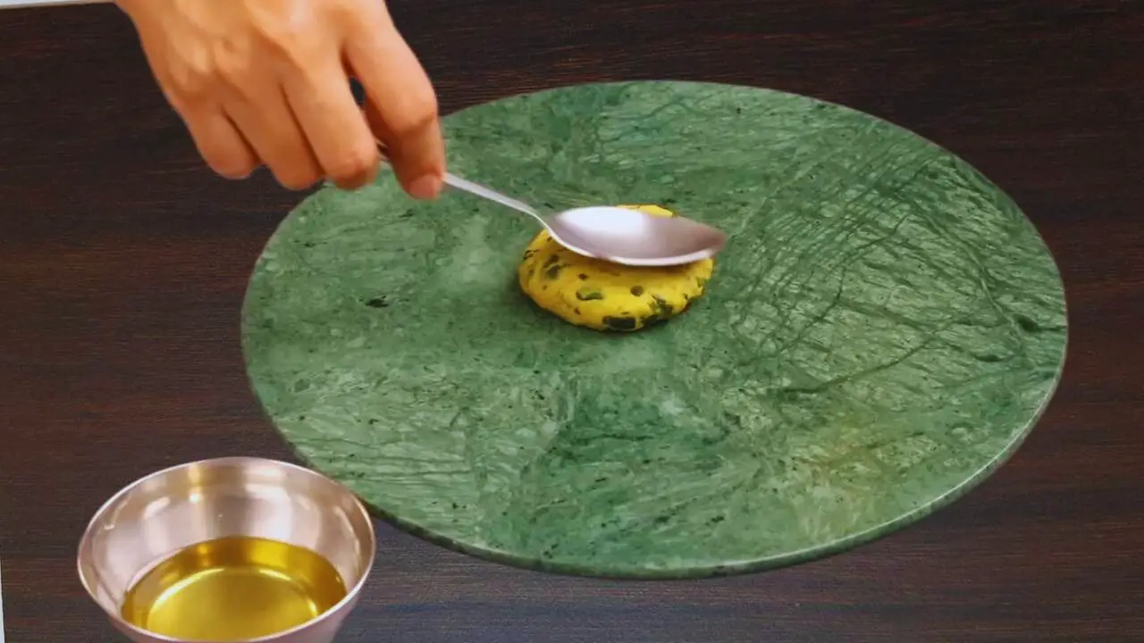 Greasing dough ball with oil 