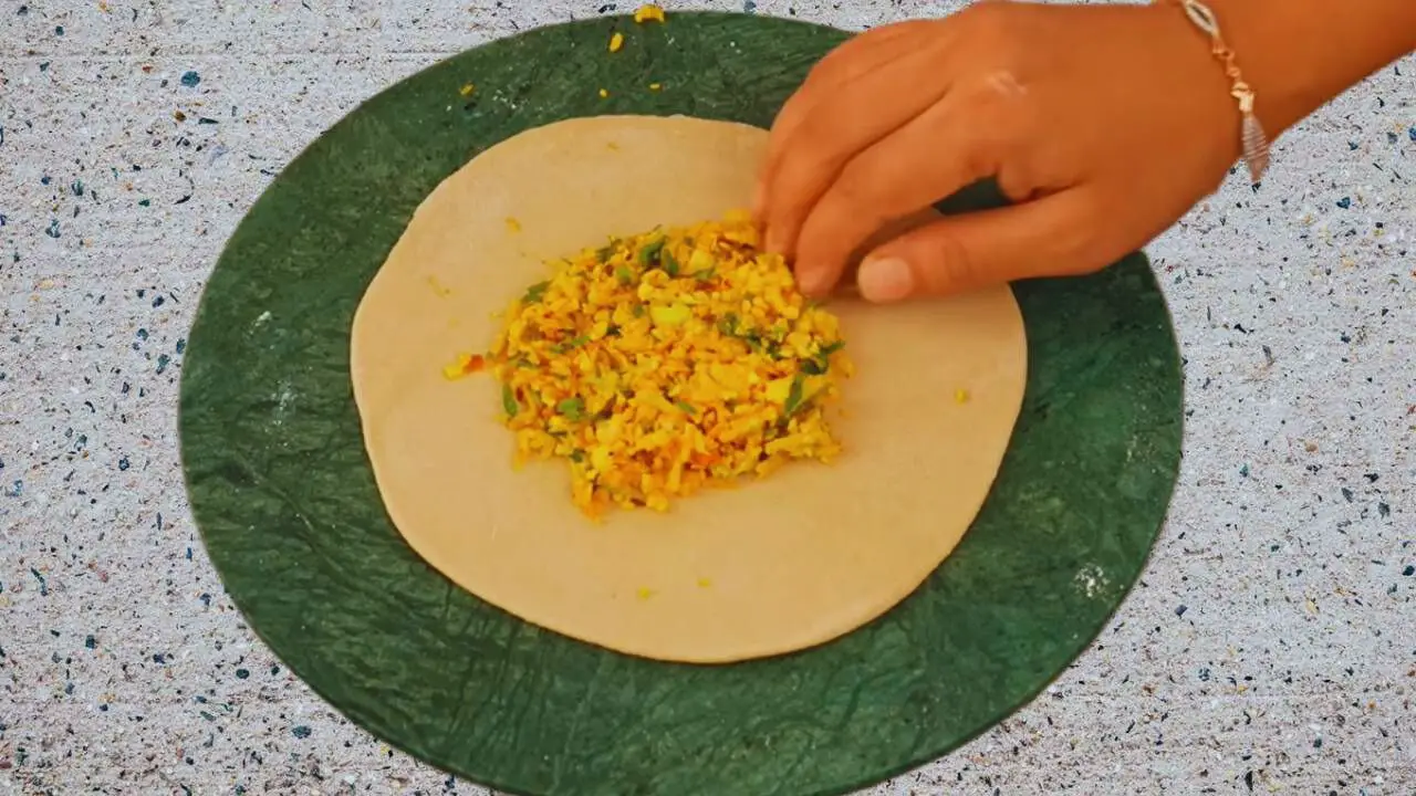 Putting the stuffing carefully 