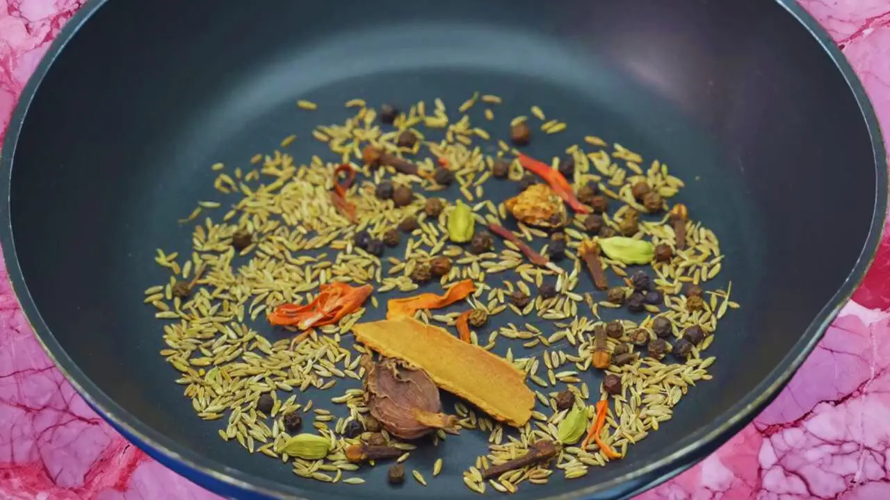 Mutton korma recipe step 9 Roasting whole spices to grind