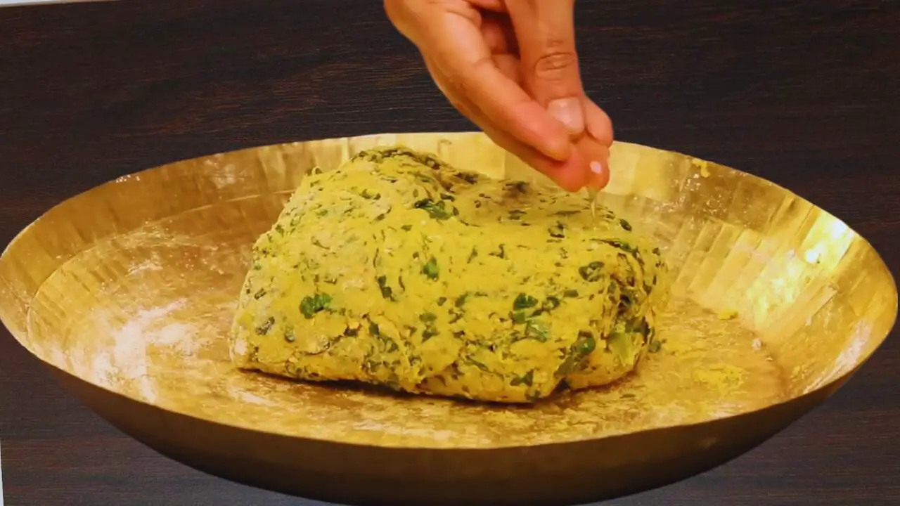 Rubbing dough with oil 