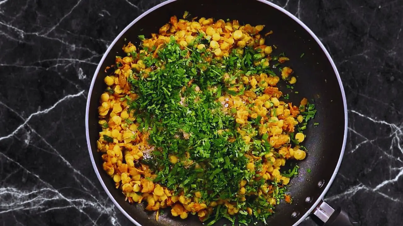 Chana dal samosa recipe step 8 Adding coriander leaves