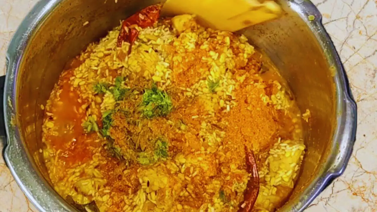 Chicken khichdi recipe step 11 Adding garam masala and coriander leaves