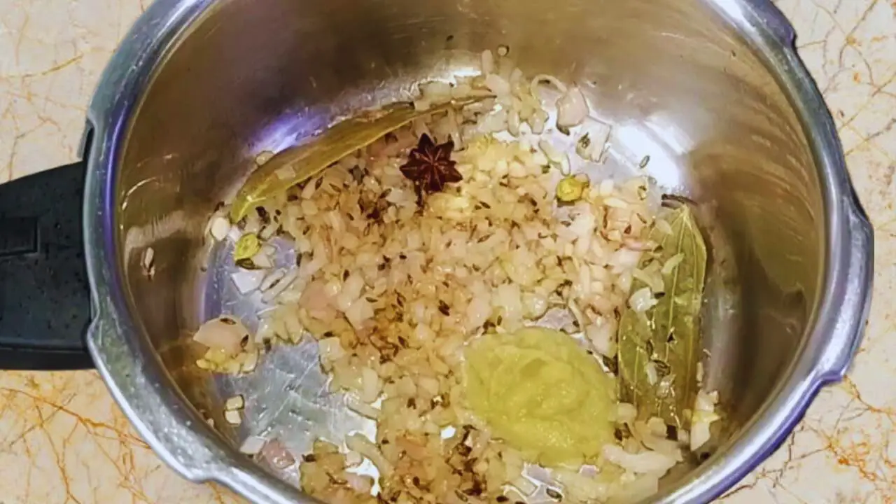 Chicken khichdi recipe step 5 Adding ginger garlic paste