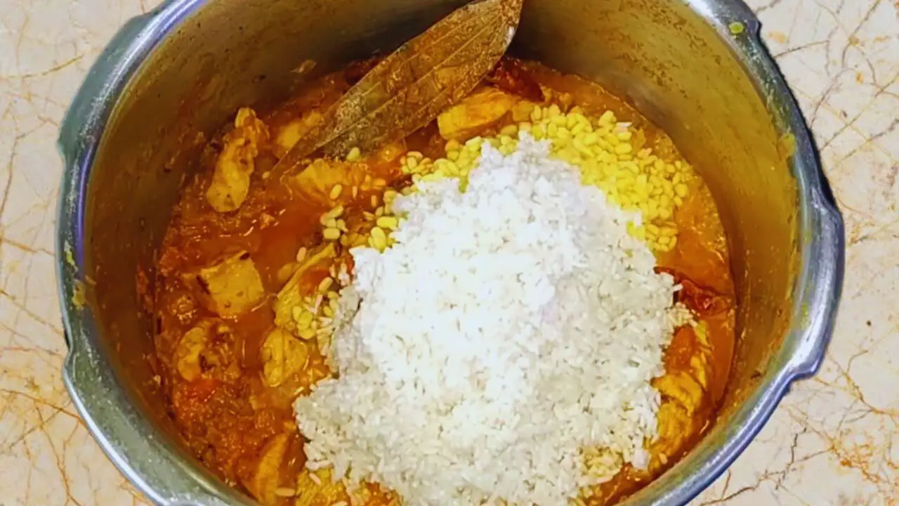 Chicken khichdi recipe step 10 Adding rice and dal