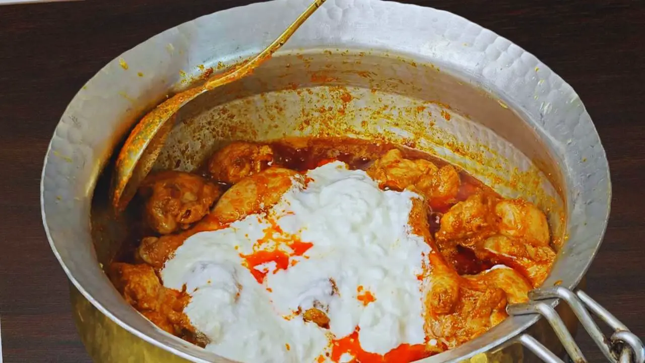Chicken korma recipe step 7 Adding yogurt