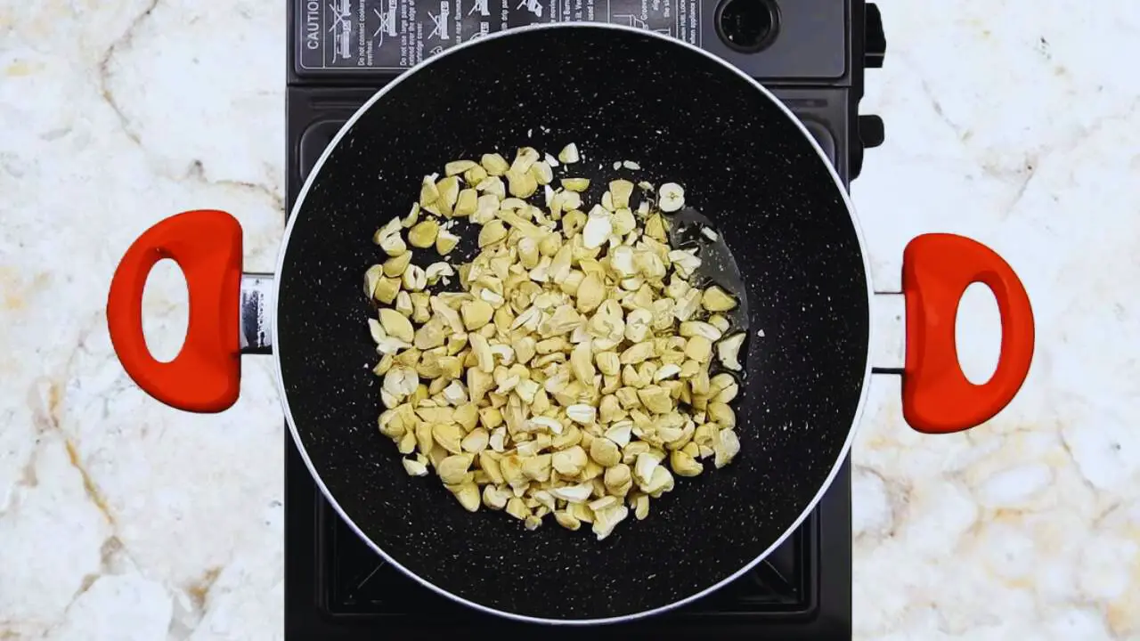 Dry fruit laddu recipe step 3 Frying cashew nuts