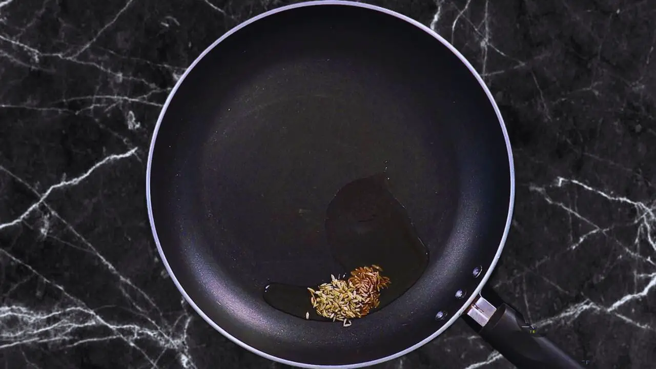 Chana dal samosa recipe step 1 Frying cumin and fennel seeds