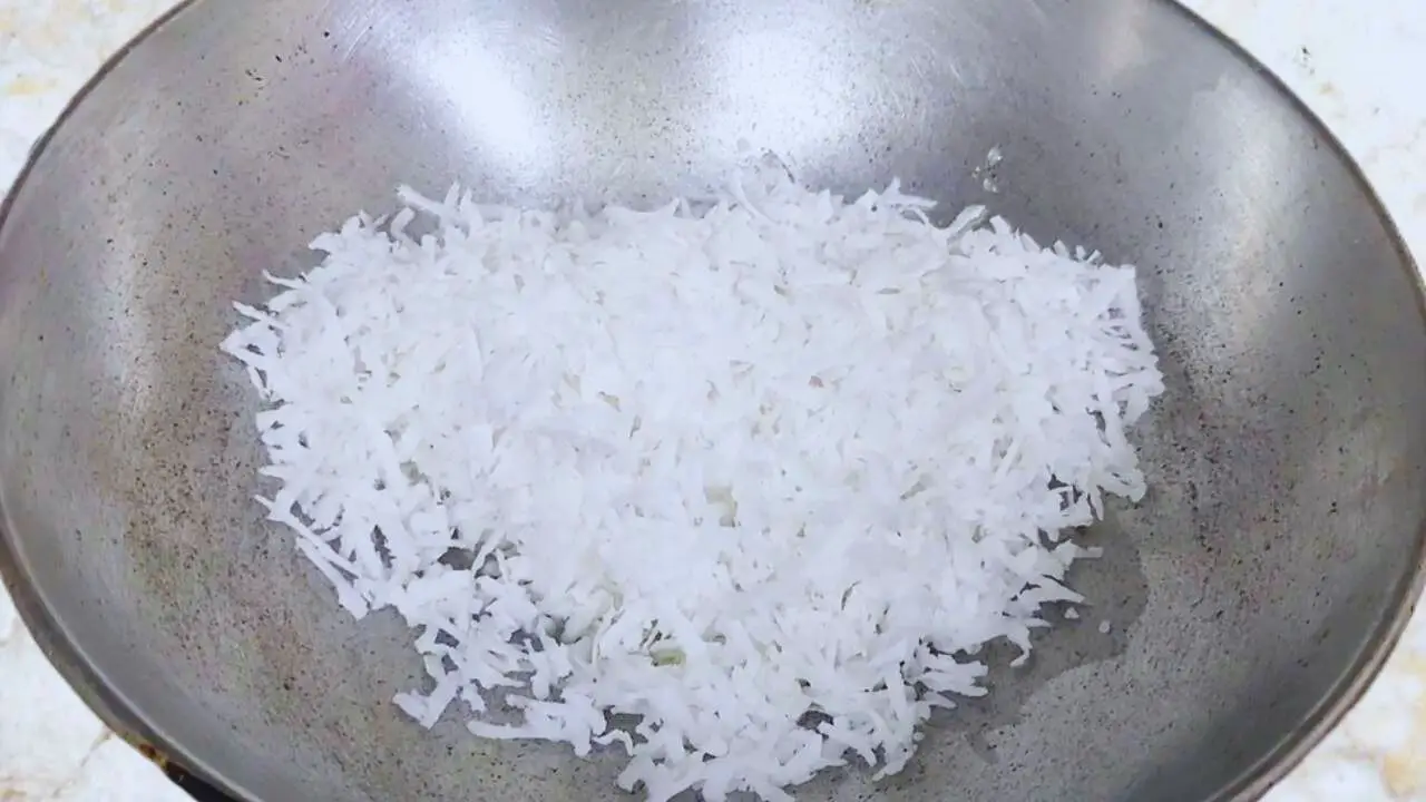 Frying grated coconut