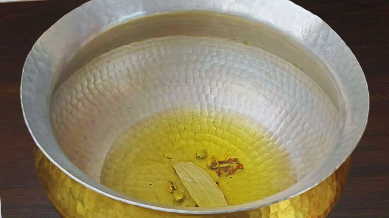 Chicken korma recipe step 3 Frying whole spices