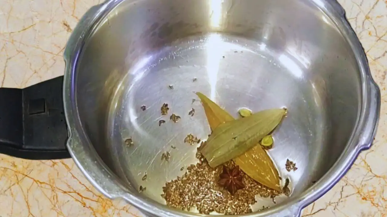 Chicken khichdi recipe step 3 Frying whole spices