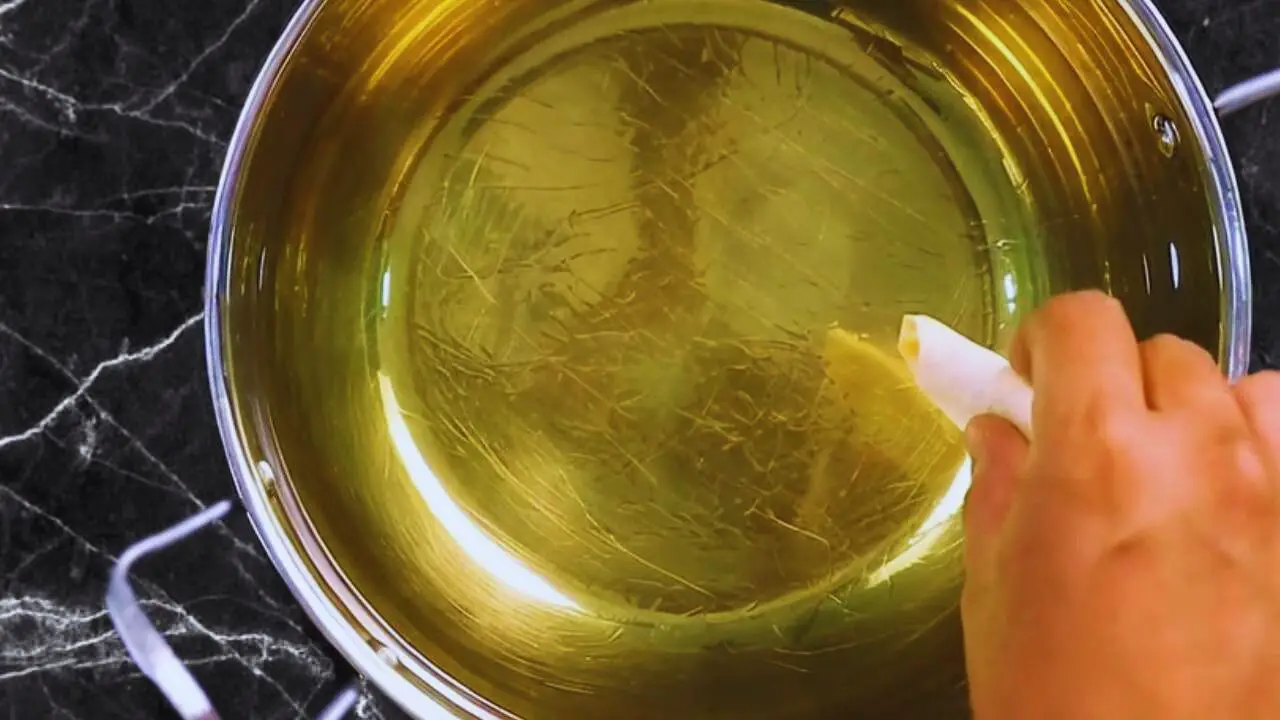 Chana dal samosa recipe step 13 Releasing samosa in hot oil