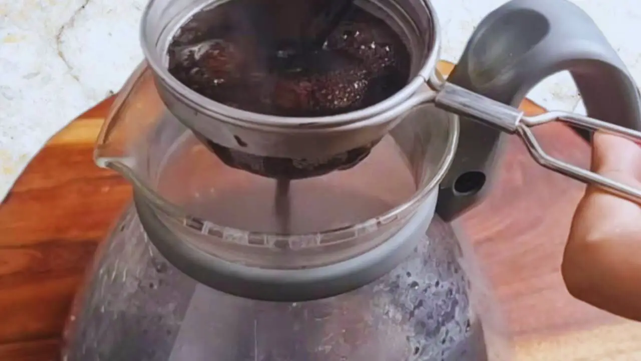 Kashmiri pink tea recipe step 4 Straining kahwa