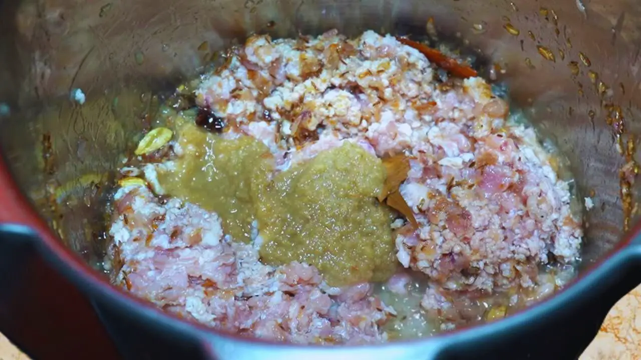 Adding ginger garlic paste 