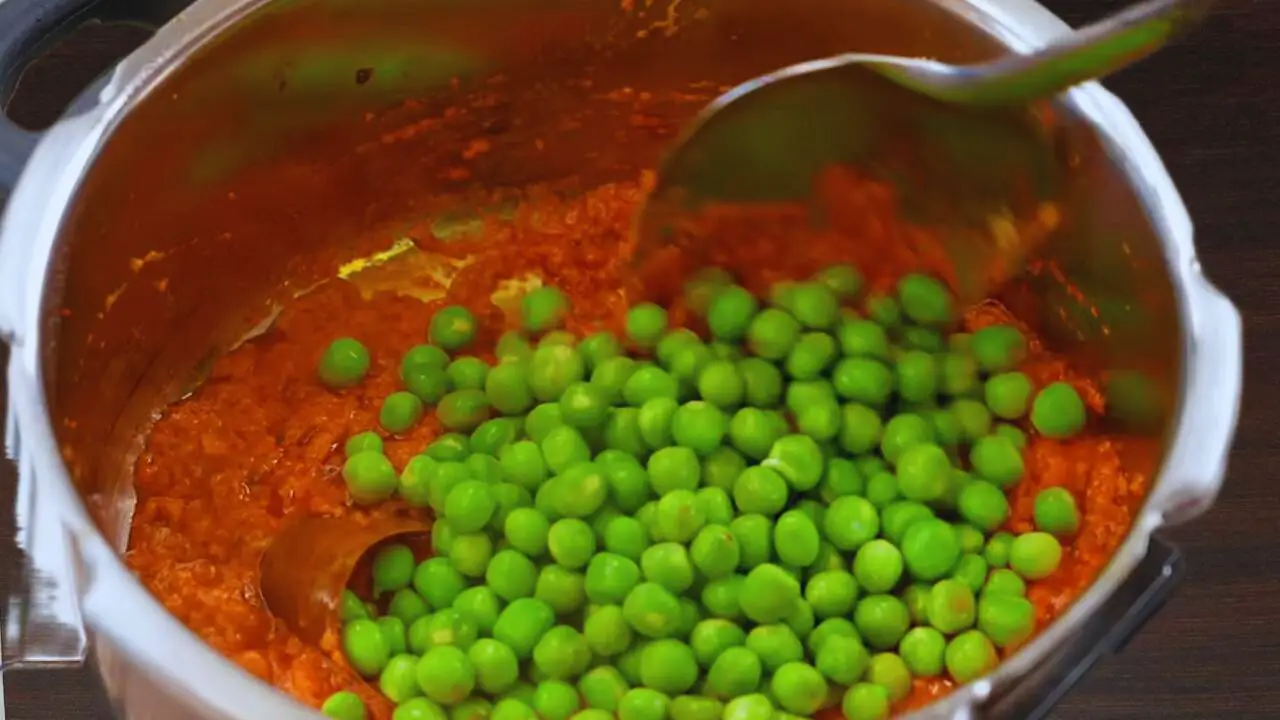 Matar paneer recipe step 9 Adding green peas