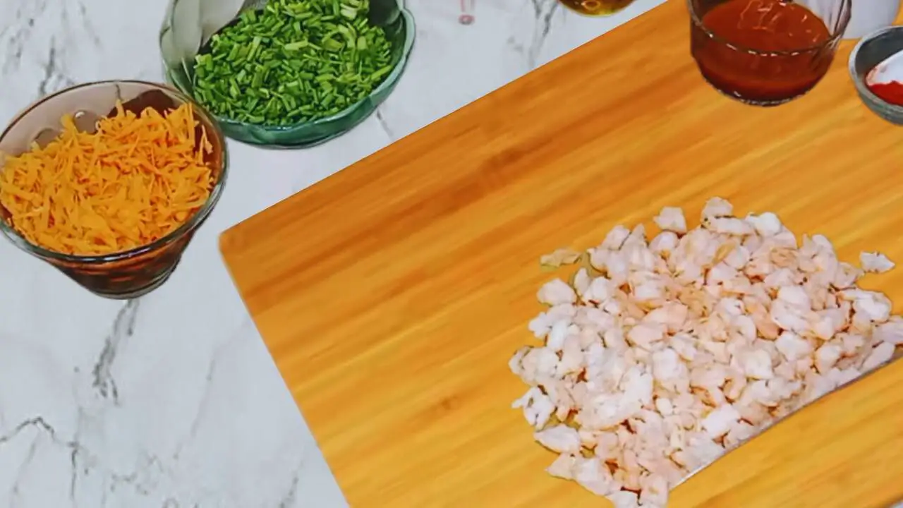 Prawn pockets recipe step 1 Chopped prawns, carrots, and spring onions