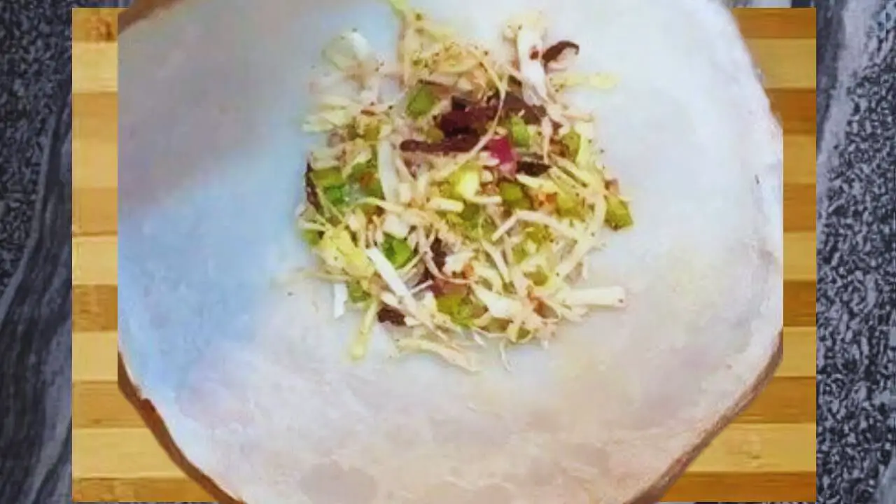 Putting vegetable stuffing 