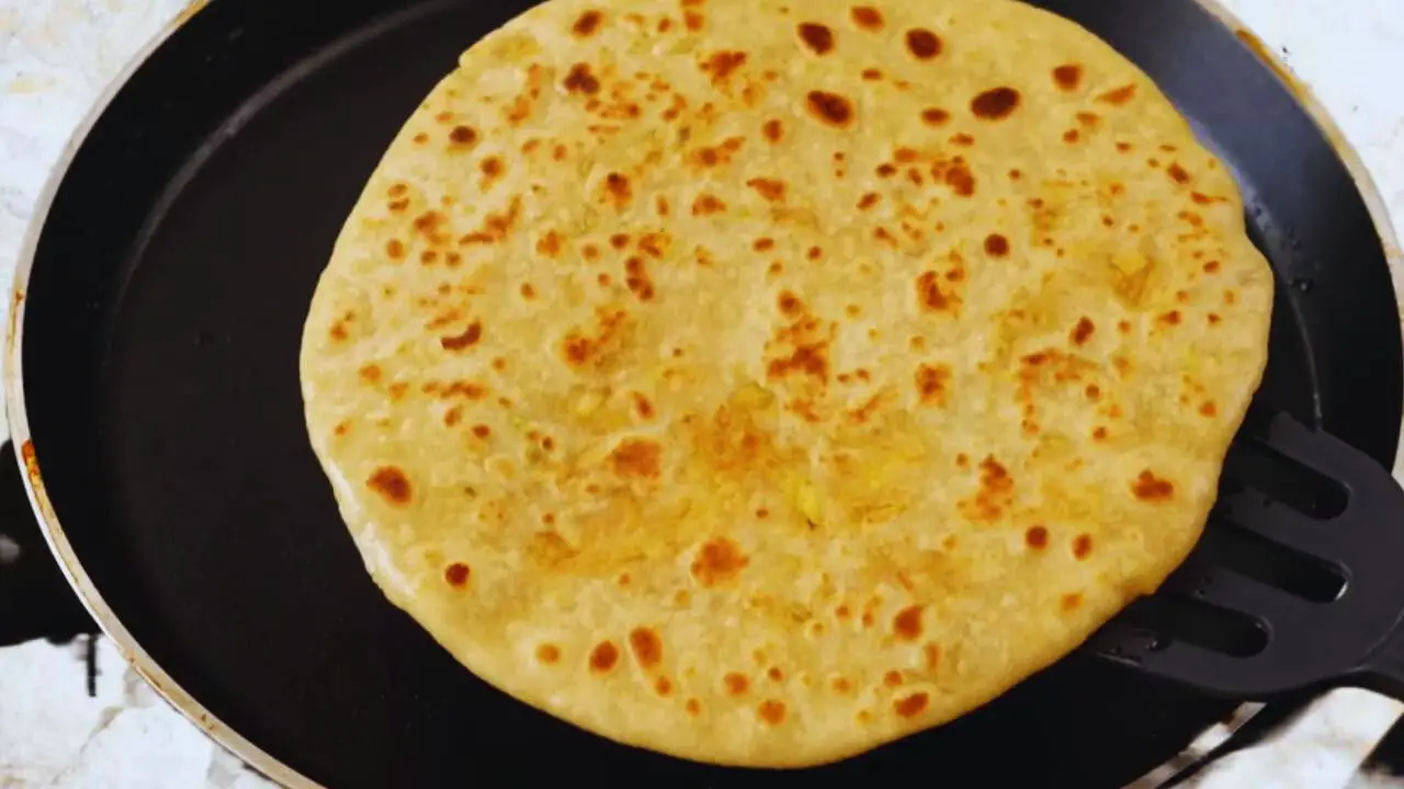 Mooli paratha recipe step 12 Removing mooli paratha