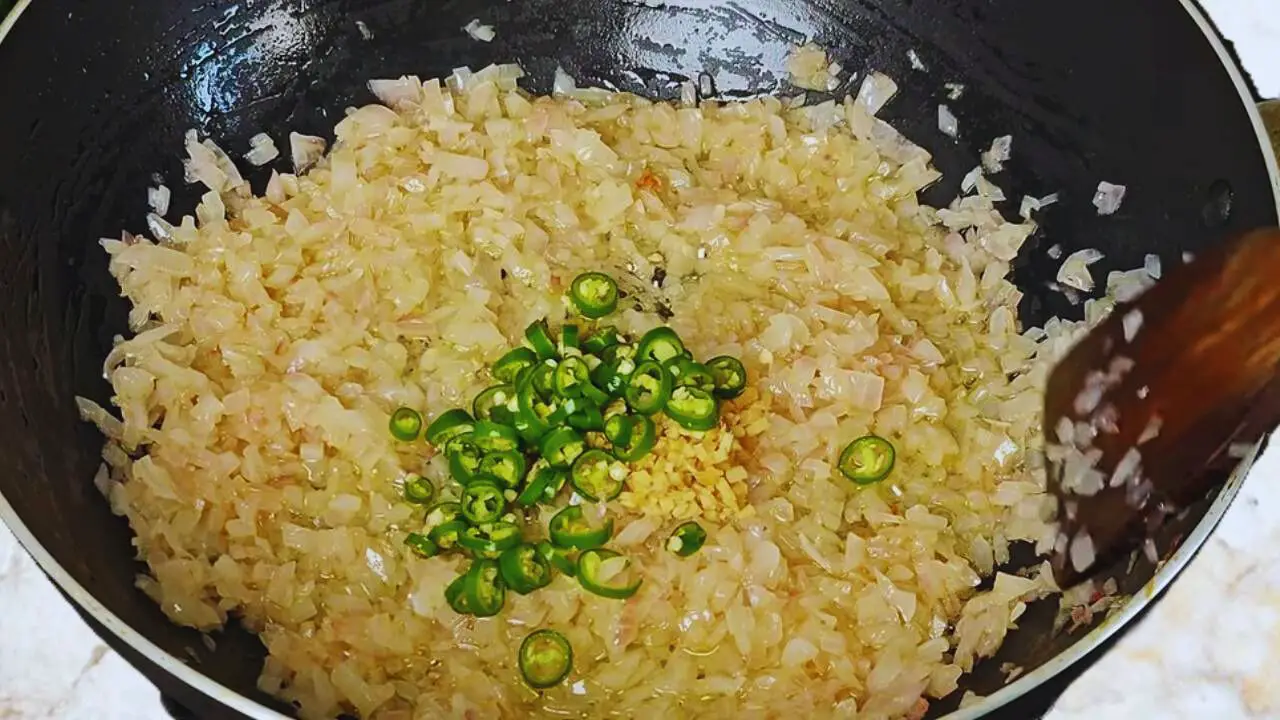 Adding chilies and ginger 