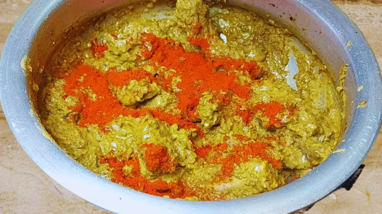 Adding Kashmiri red chili powder 