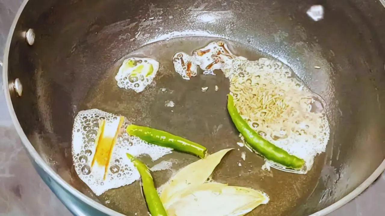 Paneer khichdi recipe step 3 Frying whole spices