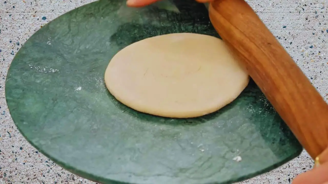 Sattu paratha recipe step 5 Rolling the Sattu Paratha