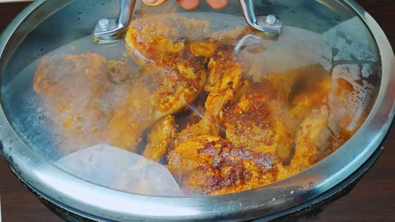 Chicken kalmi kabab recipe step 4 Covering and cooking chicken until tender