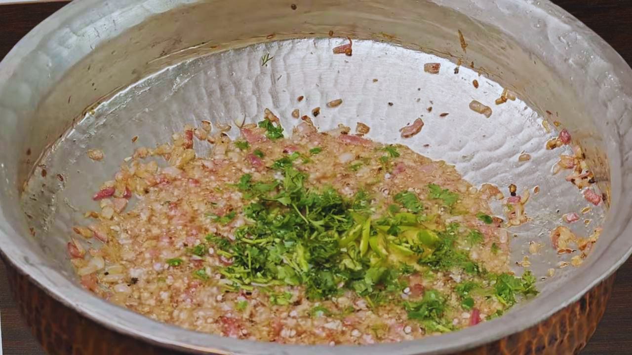 Adding ginger, garlic, chilies and coriander 