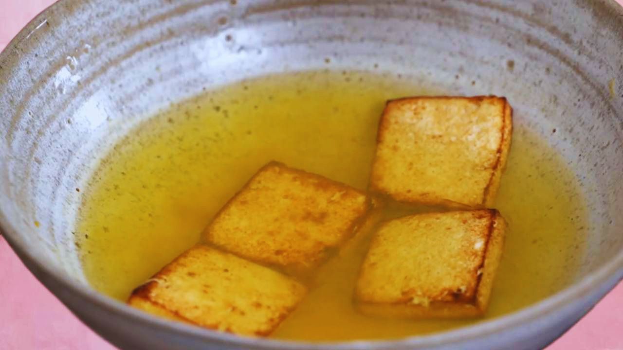 Fried paneer pieces dipped in salt and turmeric water 