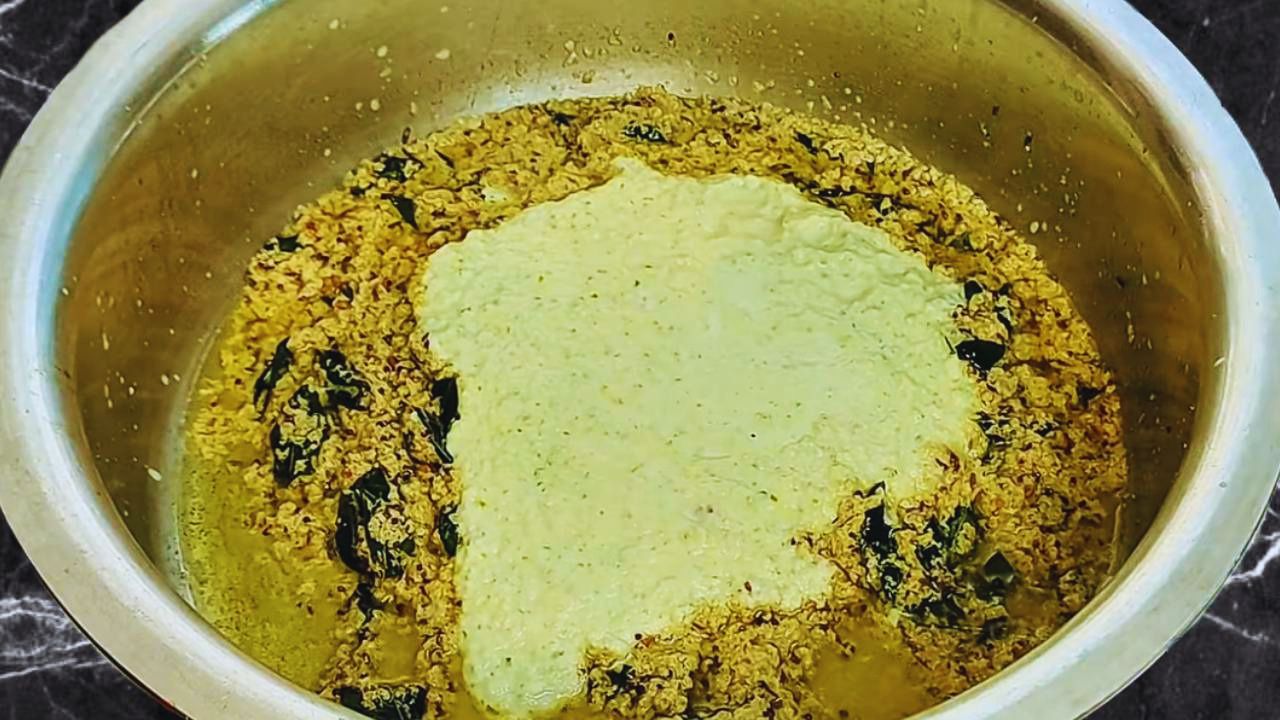 Fish coconut milk curry recipe step 8 Adding coconut, onion, ginger garlic and green chili paste