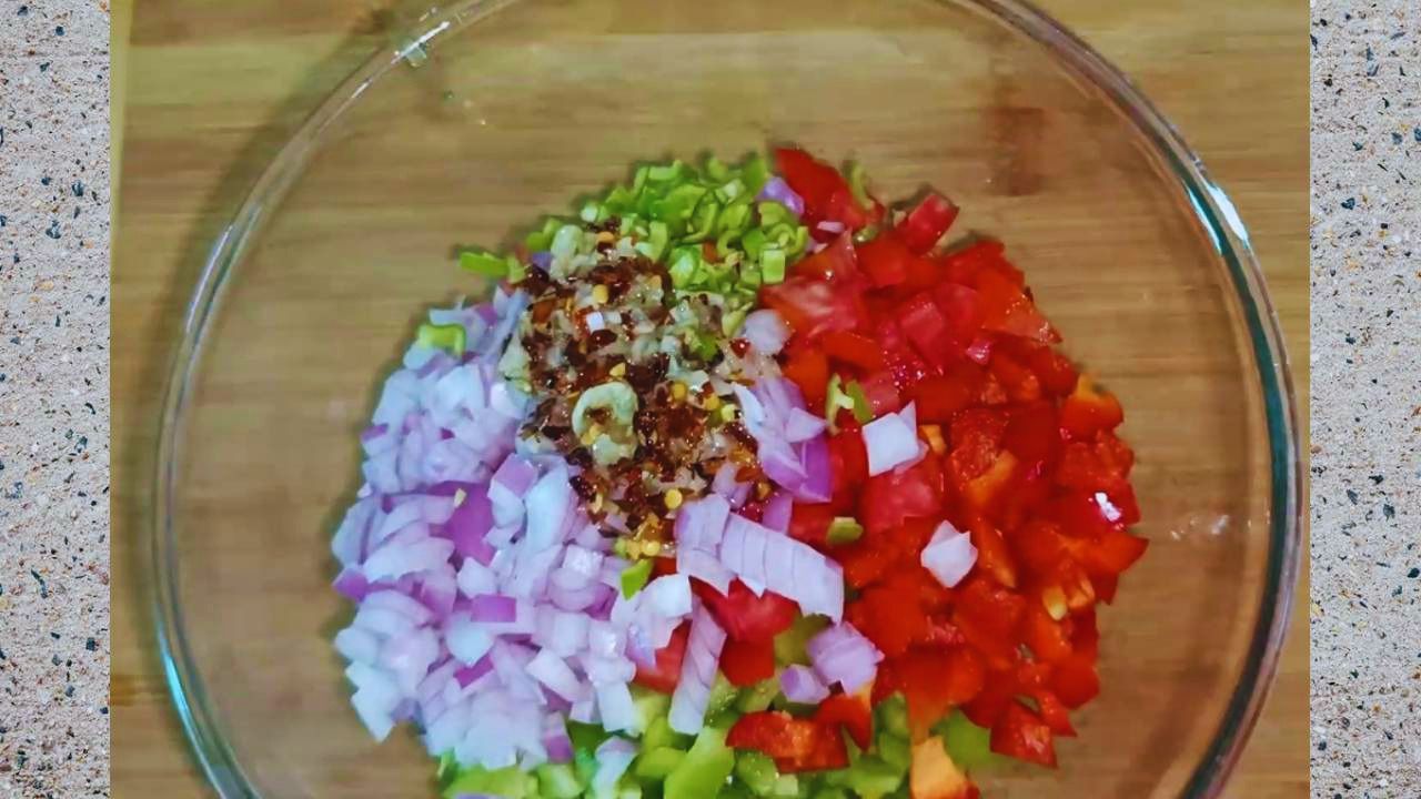 Corn paneer salad recipe step 2 Mixing veggies with salad dressing