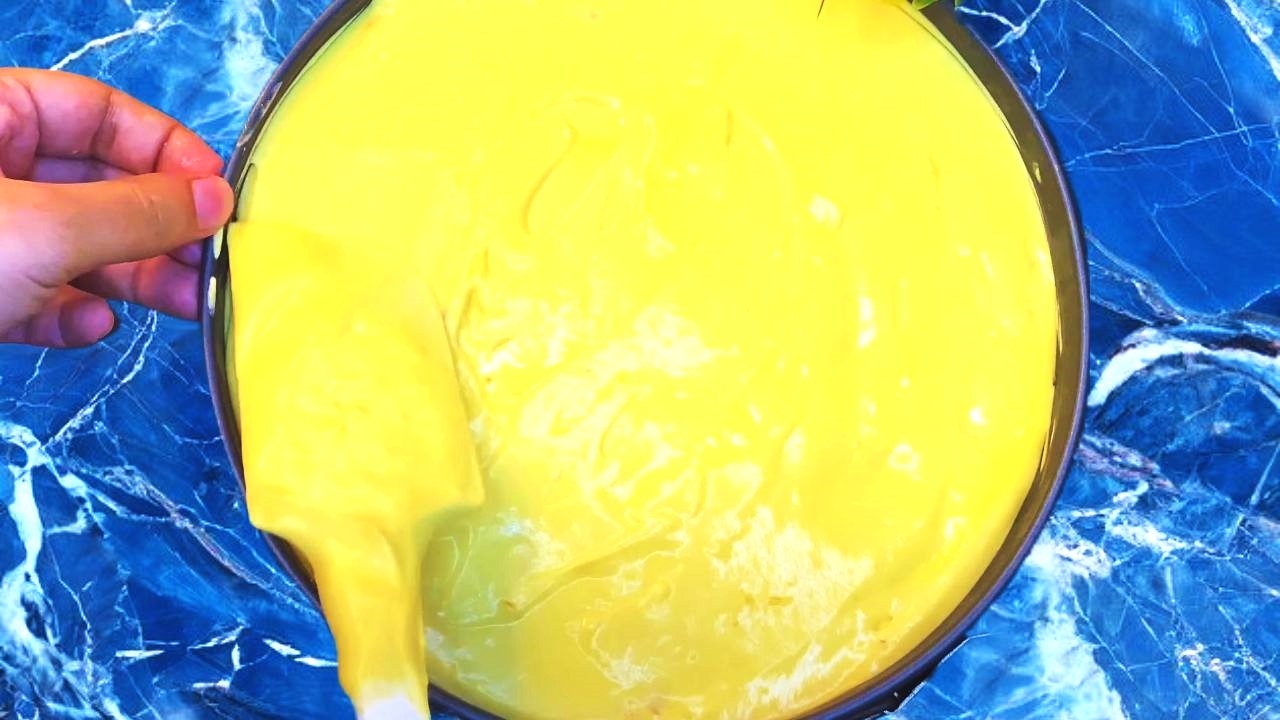 Mango cheesecake recipe step 9 Smoothing the surface and sides
